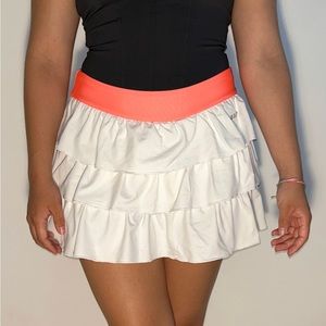 Size S white tennis skirt with neon orange waist line